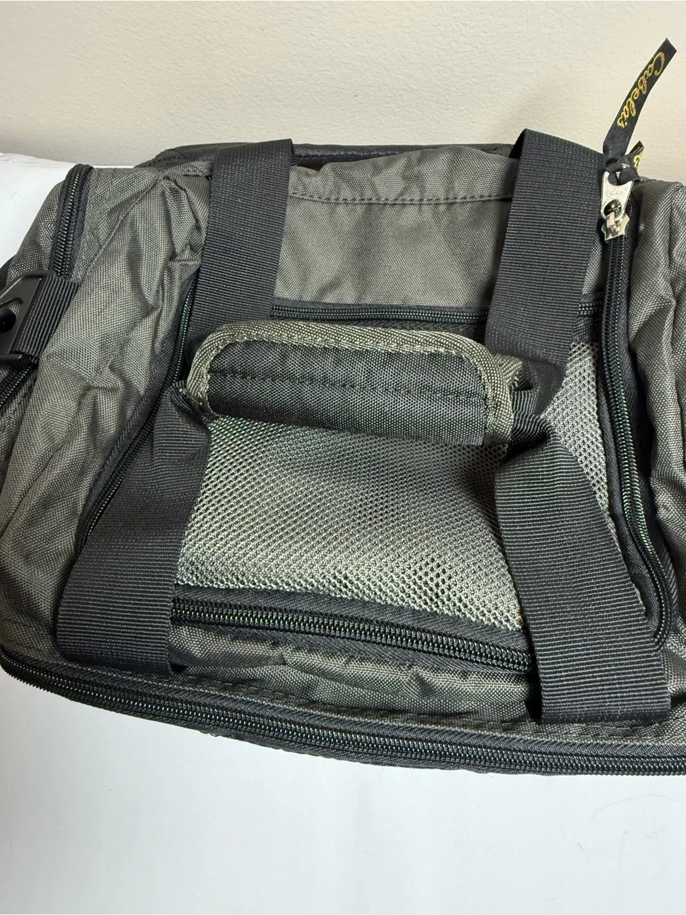 Cabela's Olive Green and Black Duffel Bag with Yellow Logo
